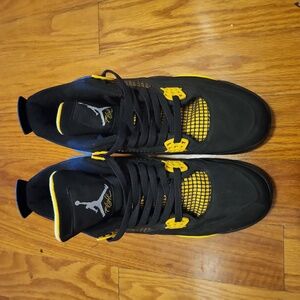 Nike Jordan 4 Thunder Black and Yellow Sneakers